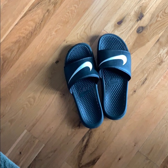 blue and black nike slides